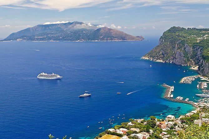 Amalfi to Capri Private Boat Tour - Capri from the water: Faraglioni, grottos, Marina Piccola, and the hole view