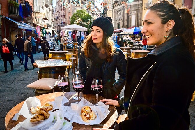Authentic Naples Food Tour with 8+ Tastings of Pizza, Wine & More - Via San Gregorio Armeno: the street of what people still love