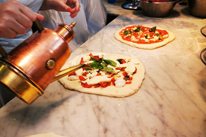 Authentic Pizza Making Class in Naples with Appetizers and Drink - Group size, language, and the feel of the class