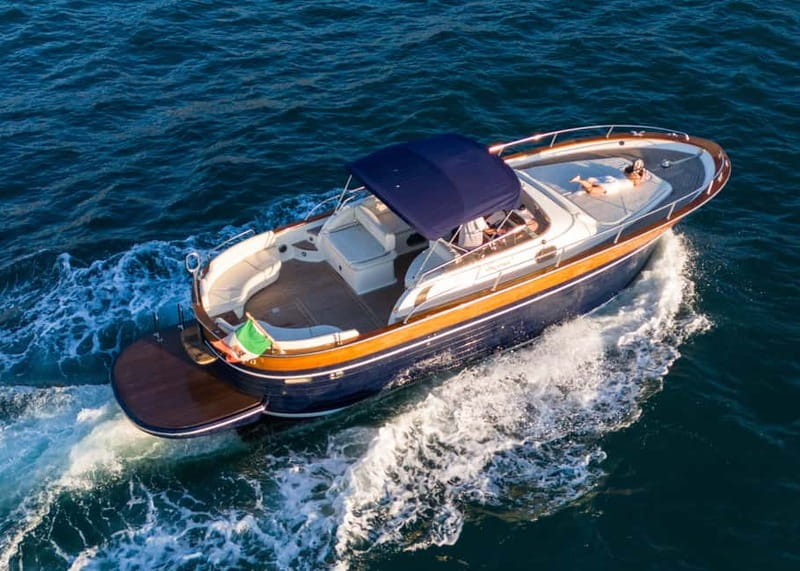 Capri : 2 Hours Private Boat from Capri - The Song of the Sea, Welcome Drinks, and a Capri “Dolce Vita” Pace