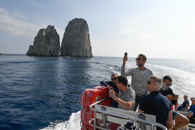 Capri and Anacapri Guided Tour with Limoncello Tasting from Capri - Boat tour around the island: grotto entrances and the sea-level views