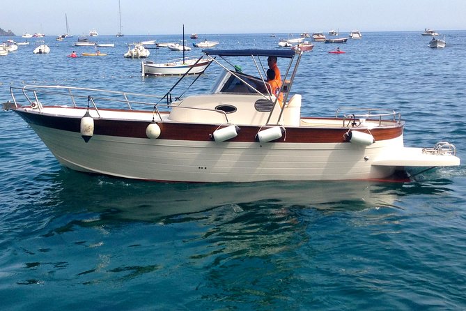 Capri & Blue Grotto Small Group Full-Day Boat Tour from Positano - Orange booth, Spiaggia Grande, and why your 8:00 am check-in matters