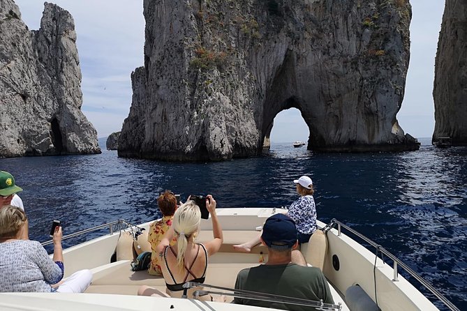 Capri Boat Tour from Naples – Small Group, Swim & Relax - Crossing the Bay: How to Get Vesuvius in Your Photos