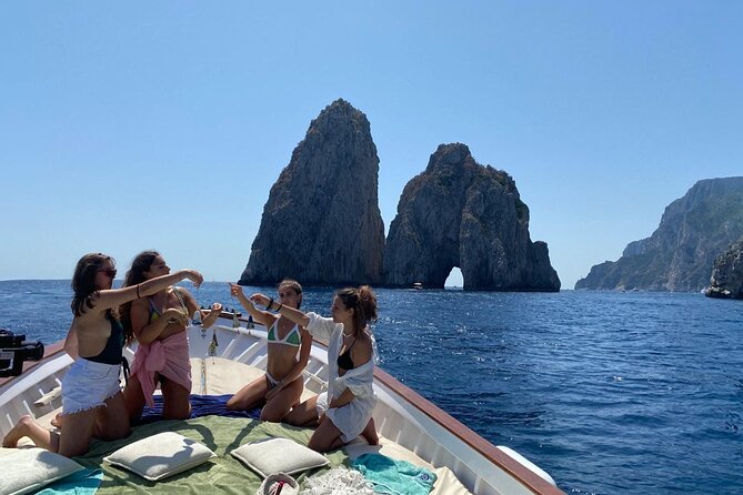 Capri Boat Tour: Grottoes, Swim & Sip Limoncello in a Small Group - The Grotto Circuit: Marvellous, White, Natural Arch, and Green Grotto Swim