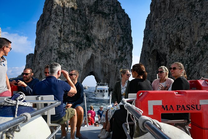 Capri Coast to Coast: Boat Tour with Optional Blue Grotto - The Coastline Loop: Natural Arch, Malaparte, Punta Carena, Faraglioni