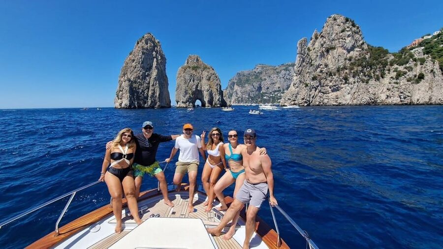 Capri: Exclusive Boat Tour of Hidden Gems with Swimming - Faraglioni Photo Stop From the Sea