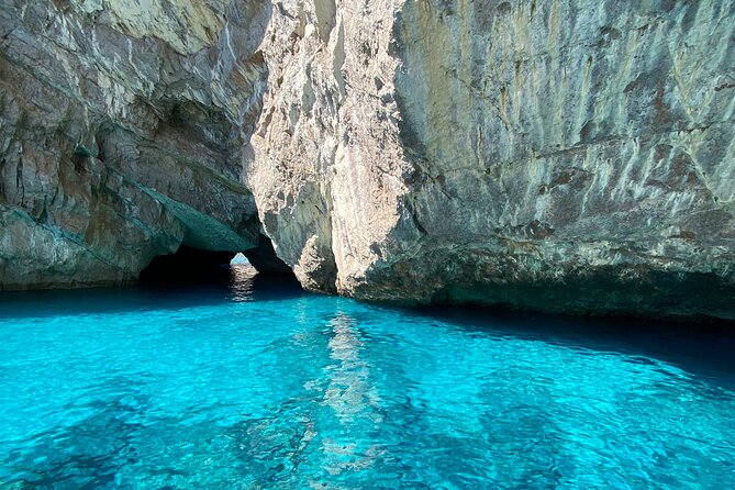 Capri excursion in a private boat - Cave stops, Natural Arch, and the “see it from offshore” advantage