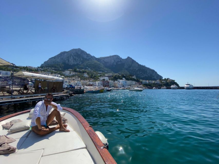 Capri: Island and Grottos Boat Cruise with Snacks and Drinks - Snacks, Drinks, and Limoncello Tasting on Deck