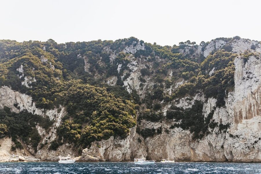 Capri: Island Boat Tour and Optional Blue Grotto Visit - Blue Grotto stop: how it works and what can change (rowboats, lines, closure)