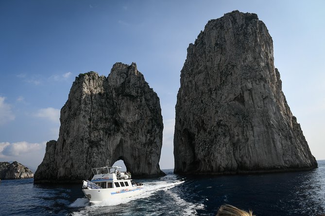 Capri Mini Cruise and City Sightseeing Day Trip from Naples - The boat loop: grottos, archways, and Malaparte and Punta Carena from sea level