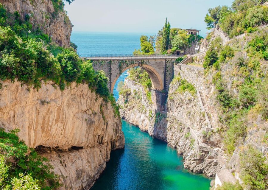 From Amalfi: Capri Island Boat Tour with Snorkeling & Drinks - Amalfi Coast cruising stops: viewpoints, arches, and the famous names you spot from the water