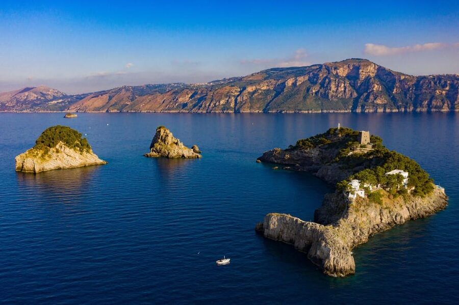 From Amalfi: Group Boat Tour to Capri with Swimming - Second Swim Stop near Capri: Cool Off, Then Jump to Land Time