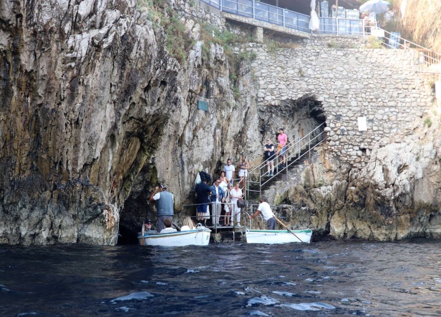From Capri: Blue Grotto, Capri and Anacapri Guided Tour - Capri Town Walk: Main Square, Narrow Lanes, and the Bougainvillea Effect