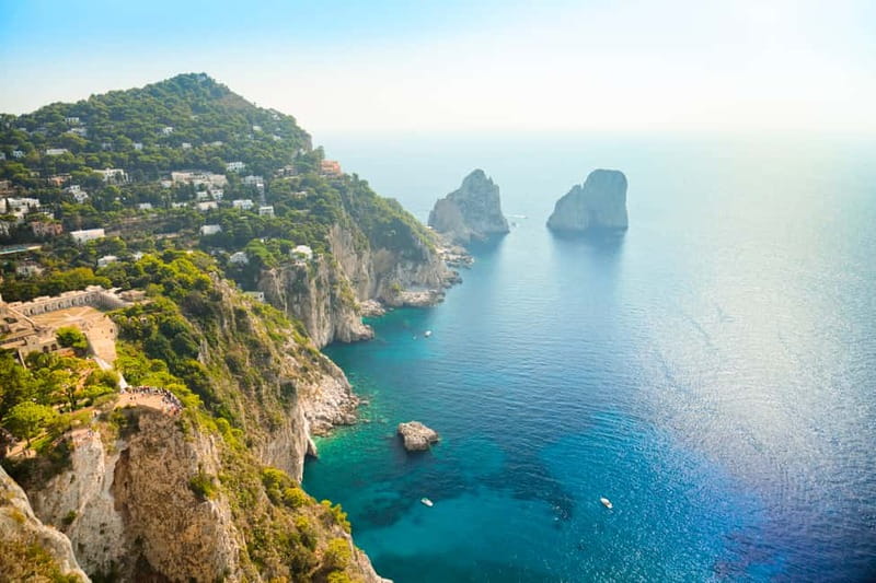 From Naples: Explore Capri with Chairlift Experience - Capri Town on foot: La Piazzetta, shops, and structured free time