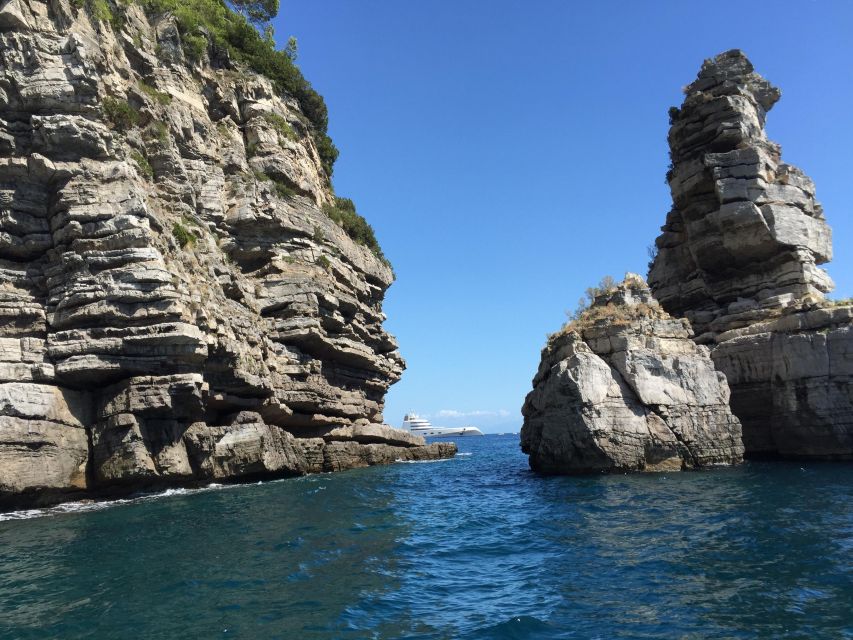 From Praiano: Amalfi Coast Guided Private Cruise with Drinks - Li Galli islands, sea caves, Emerald Grotto, and Grotta Pandora