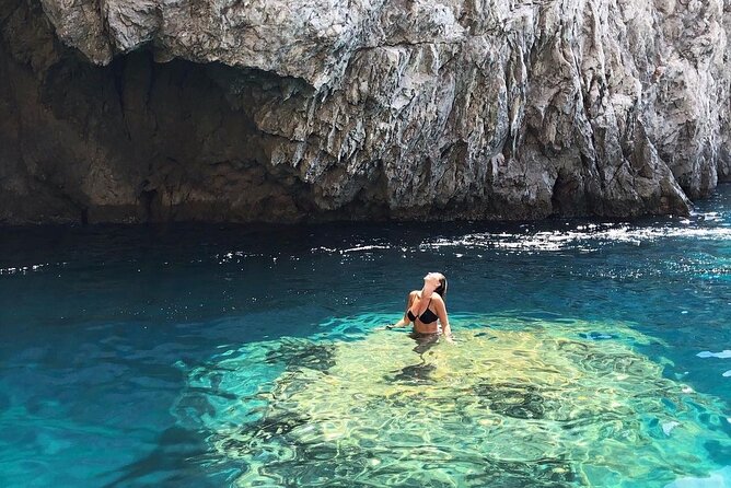 Half day tour of Capri by private boat - Faraglioni time: the rocks you came for, seen up close