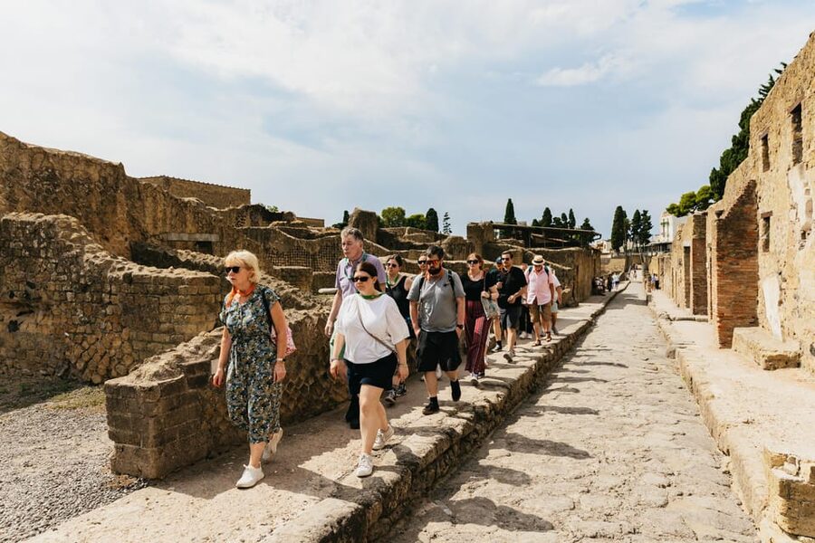 Herculaneum: Skip-the-Line Guided Tour with Archaeologist - Entering Herculaneum through the ticket office, then into the action