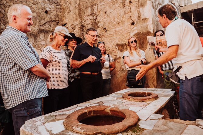 Herculaneum Small Group Tour and Ticket With an Archaeologist - What You See in Herculaneum: Houses, Baths, and the Clues in the Materials