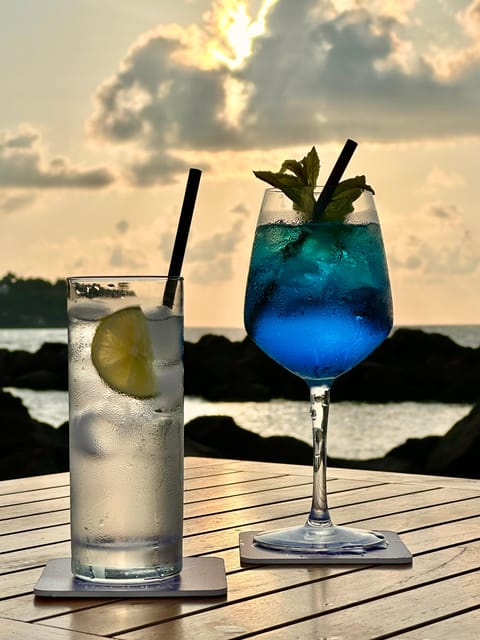 Italian aperitif at the sunset by the sea - Food Practicalities: Plates, Napkins, and Eating Comfortably