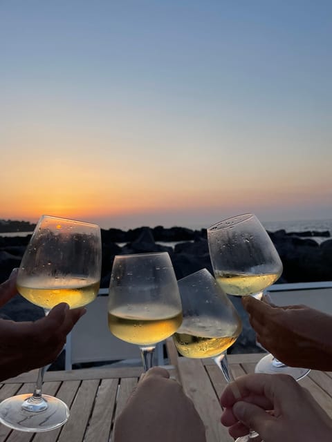 Italian aperitif at the sunset by the sea - Weather, Wasps, and Comfort Tips