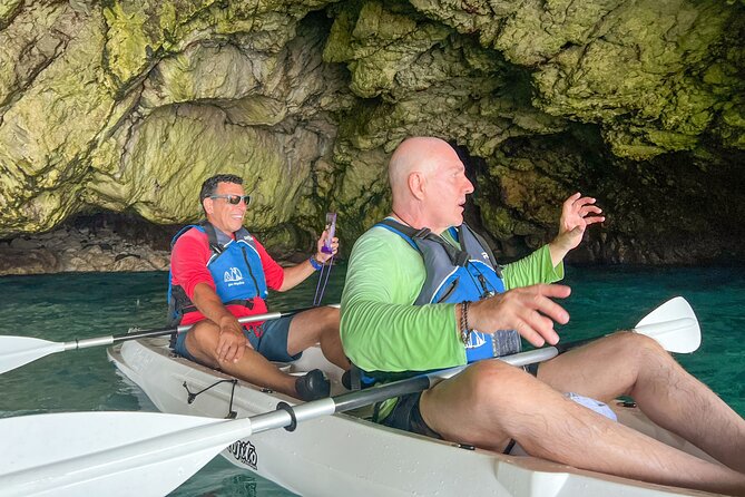Kayak tour in Capri between caves and beaches. Photos included. - Swim stop and cave water reality: what to expect