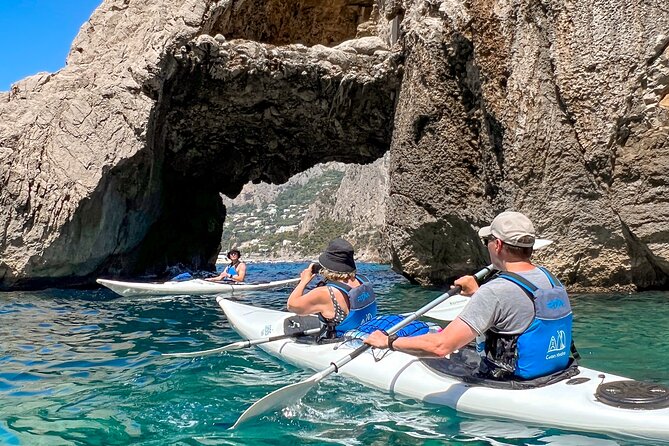 Kayak tour in Capri between caves and beaches. Photos included. - Arco della Stella: the natural arch moment