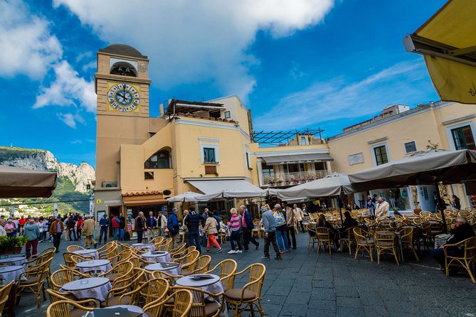 Li Galli Islands and Capri Small Group Boat Tour from Amalfi - Boarding the Gozo: Deck Time Is Part of the Appeal