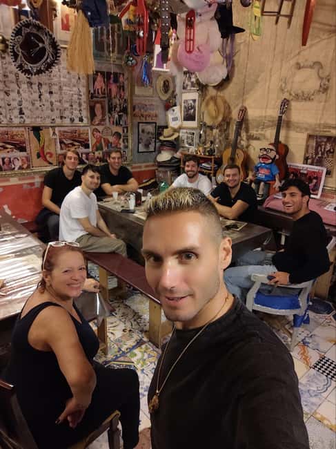 Naples: Authentic Family Home Lunch with Music Show & Spanish Quarters Tour - Quartieri Spagnoli Alley Walk: Murales Maradona and the Former Red Light District