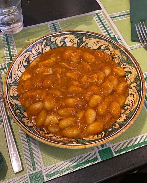 Naples: Authentic Family Home Lunch with Music Show & Spanish Quarters Tour - The Stories Behind the Stones: Femminielli, Shrines, and Munaciello