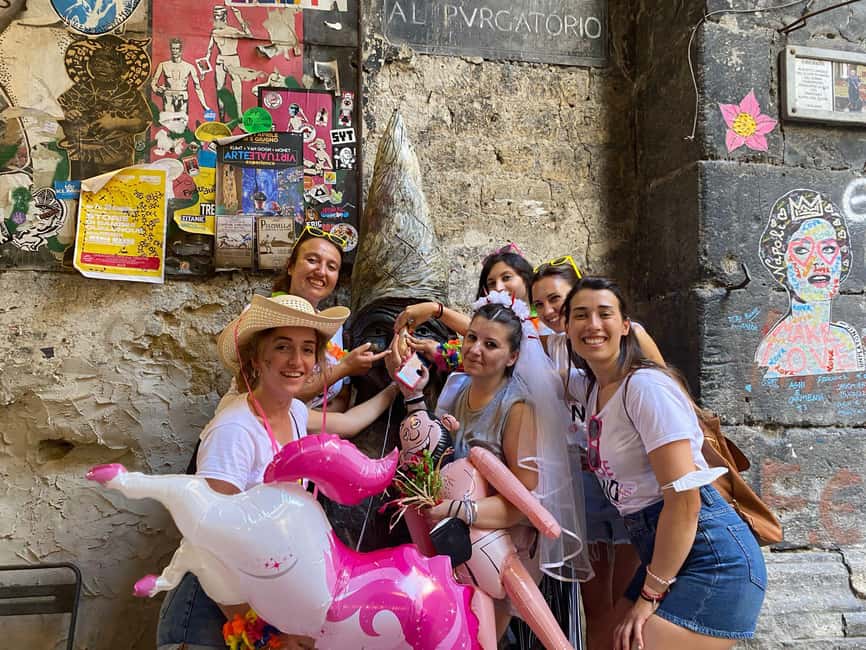 Naples: Bachelorette Party with Insolitaguida - Via dei Tribunali photo moment with a mischievous touch