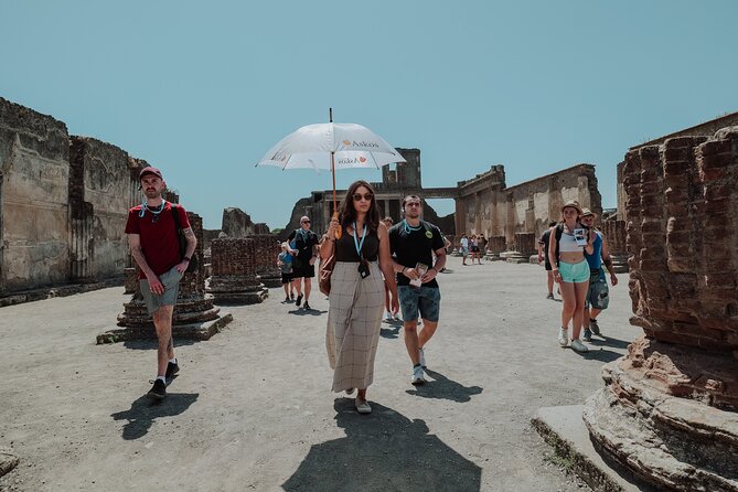 Pompeii Private Tour with an Archaeologist Guide - Entering Pompeii via Porta Marina Superiore, with a guide who sets the scene