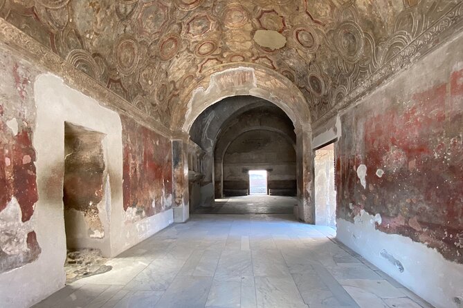 Pompeii Small Group with an Archaeologist and Skip The Line - Temples, a Backdrop of Vesuvius, and Religious Pompeii