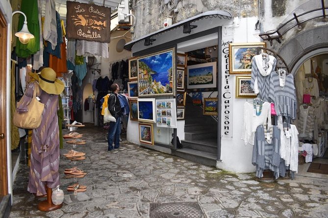 Positano & Amalfi Boat Tour from Naples with Light Lunch - Snorkeling and swimming stops: what the boat day feels like on your body