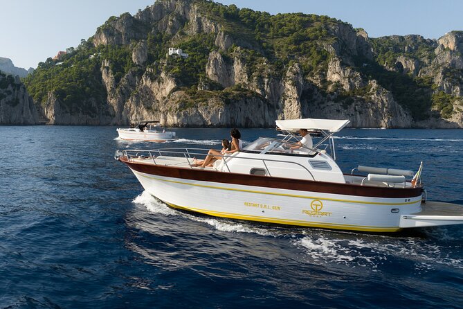 Private Boat Tour To Capri Departing From Positano - Faraglioni and Li Galli: iconic rocks, then mythic islets