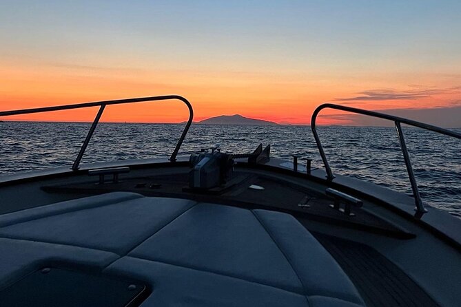 Shared Sunset Cruise from Positano with Drinks & Snacks 1.5-Hour - Photo Stops, Dolphins, and the Captain’s Style