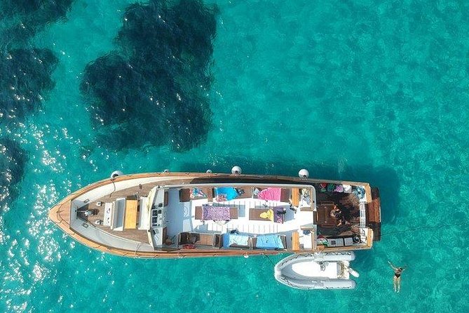 Tour of Ischia Island with Motor Yacht Rocca Corsa - San Pancrazio and Grotta dell’Amore: The Cove and the Light Show