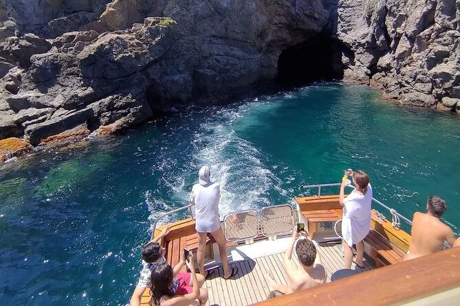 Tour of Ischia Island with Motor Yacht Rocca Corsa - Baia di San Montano: Lunch, Wine, Limoncello, and a Hot Pastry Moment