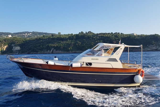 Very Small Group Capri Boat Excursion with Transfer from Positano - Onboard Comfort: Music, Soft Drinks, and Limoncello and Prosecco